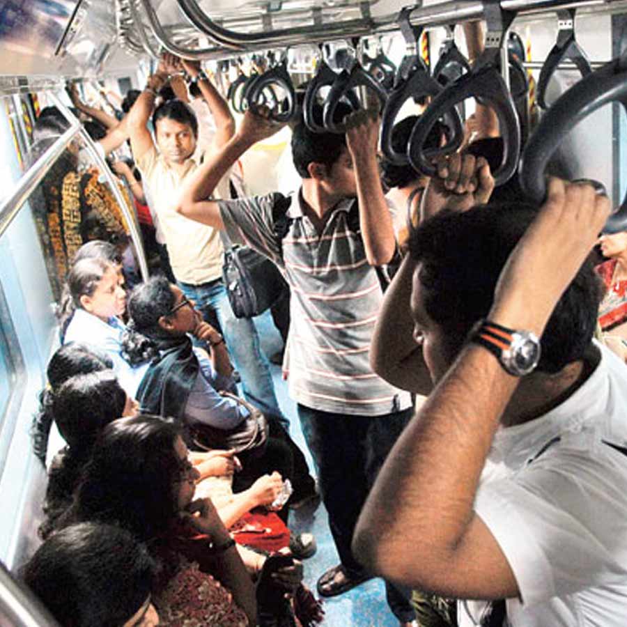 A passenger press alert button in Kolkata Metro, service dipute