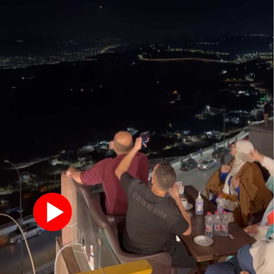 Video of Jordan cafe customers watching Israel-Iran missile exchange in night sky dgtl