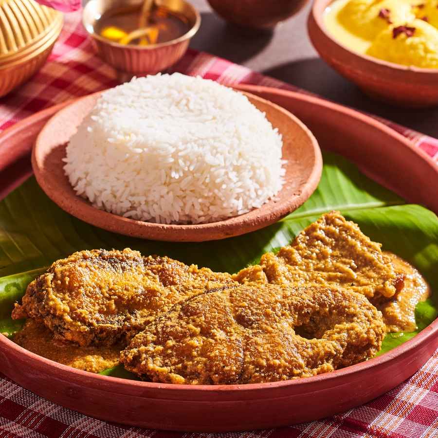 A fusion recipe of rohu or bhetki fish in curd and poppu seed curry dgtl