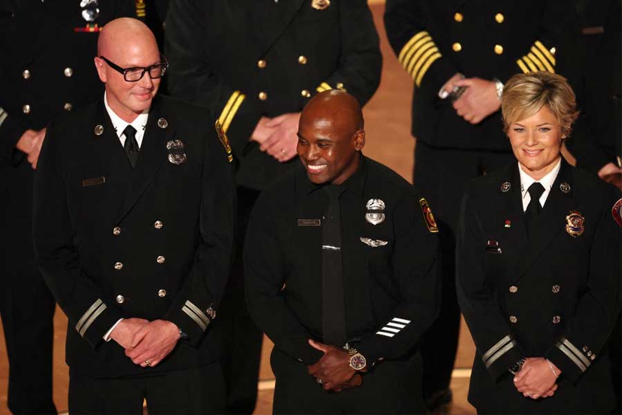 Los Angeles Fire Department members appear onstage for a tribute during the Oscars show 