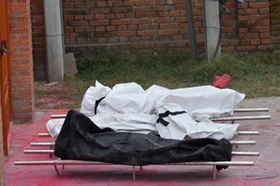 Police recover three body of same family in Madarihat