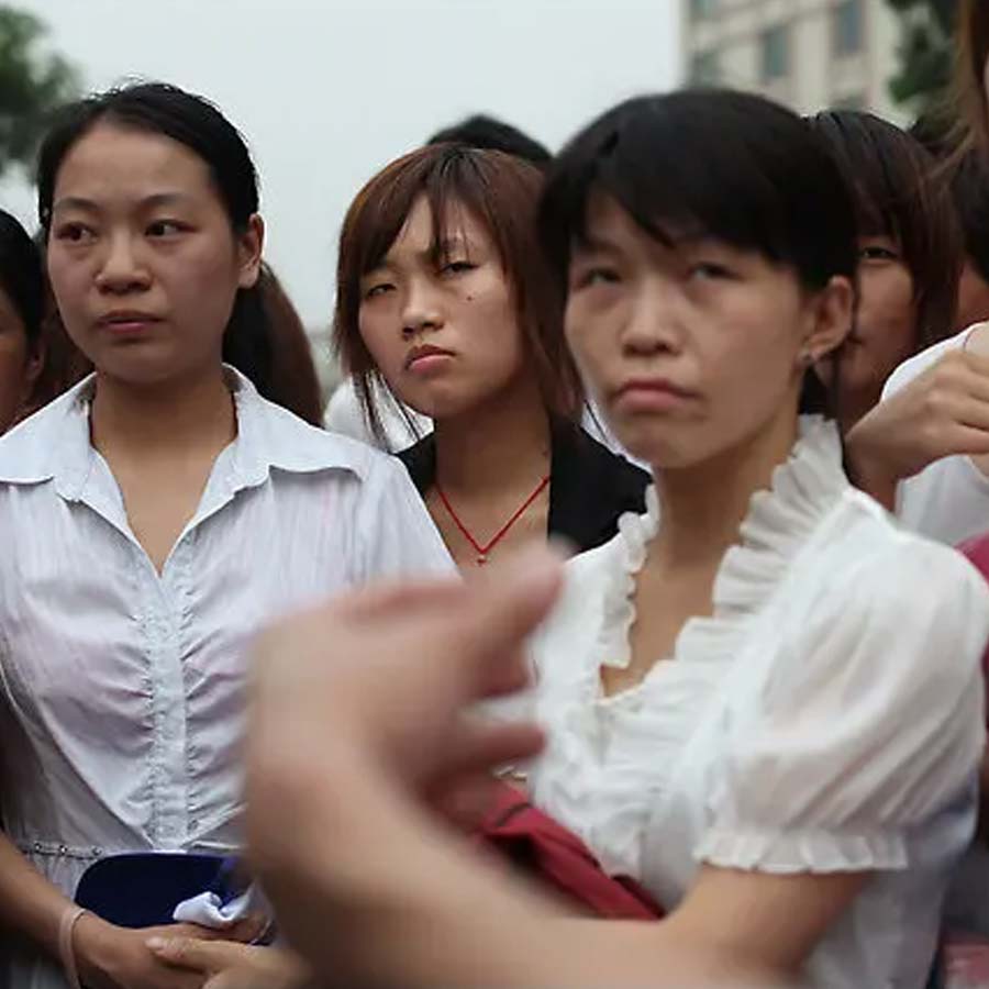 Chinese workers protest raises high over unpaid wages and factory shut down amid tariff war with US
