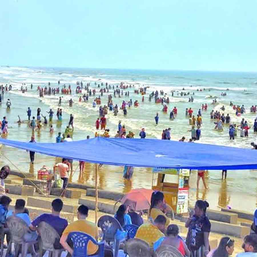 Tourists searching for new sea beach for bathing at Digha