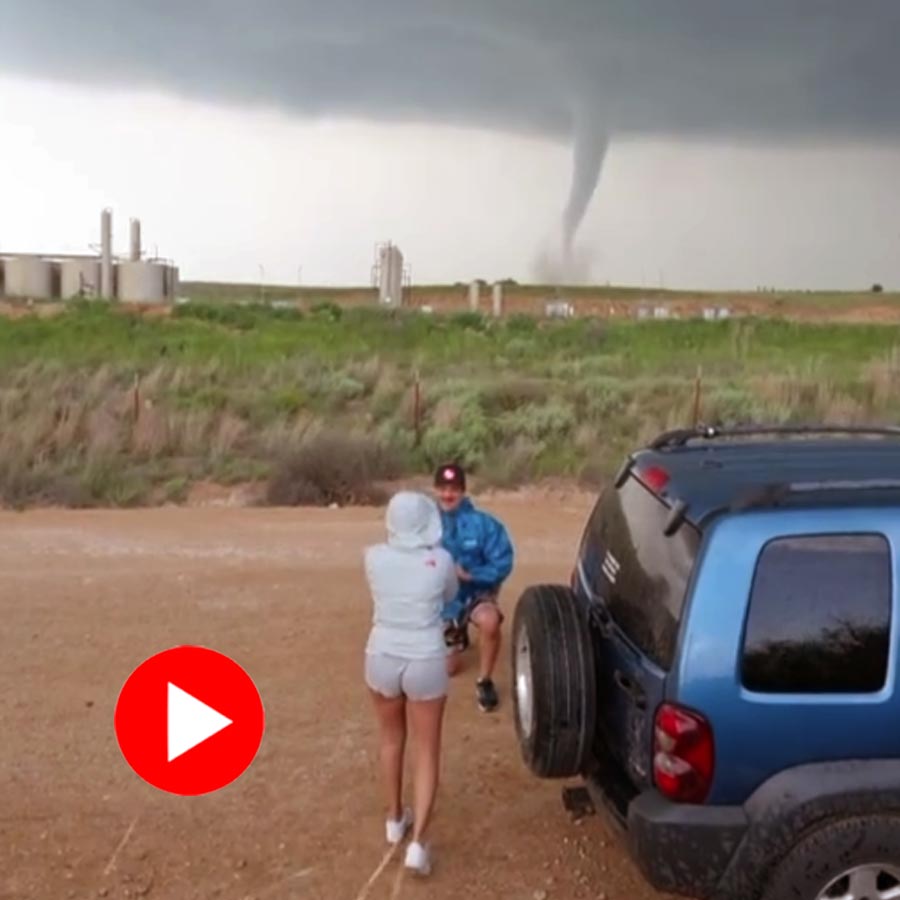 Video of man proposing to his girlfriend with tornado swirling behind them goes viral dgtl