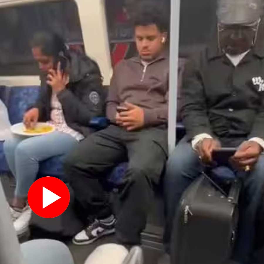 woman eating on the London Tube metro