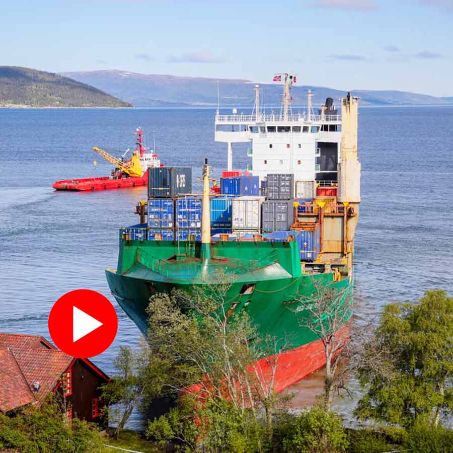 A cargo ship to run aground near a Norwegian home
