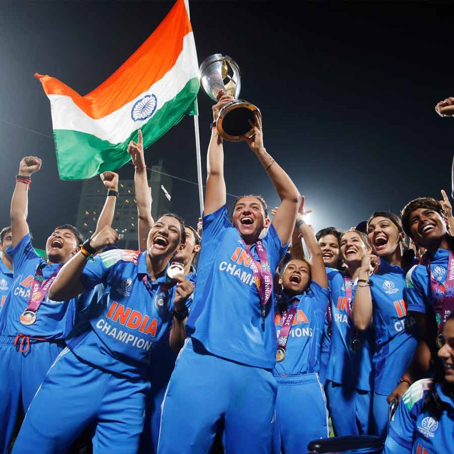 Indian women's cricket team with World Cup trophy