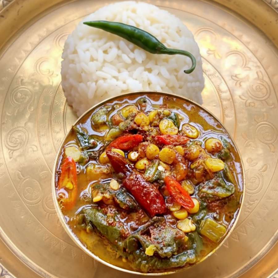 A Winter special Recipe of Kumro Shaak die Matar dal or Bengali yellow split peas dal with Pumpkin leaves dgtl