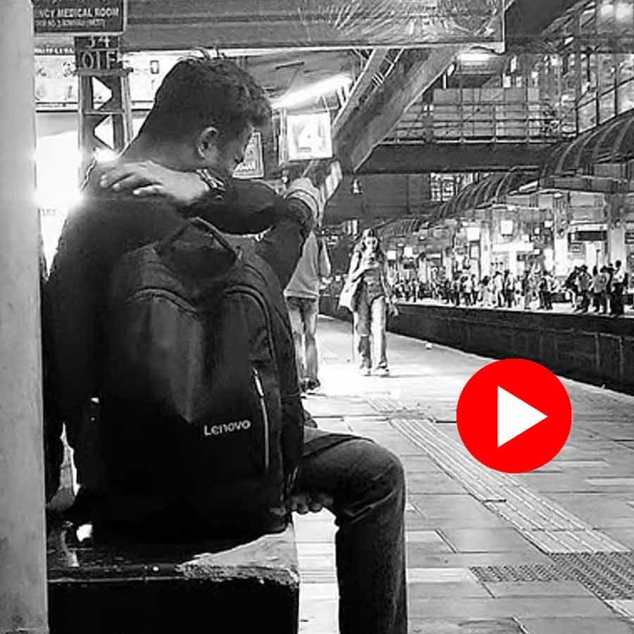 man quietly crying at Borivali station