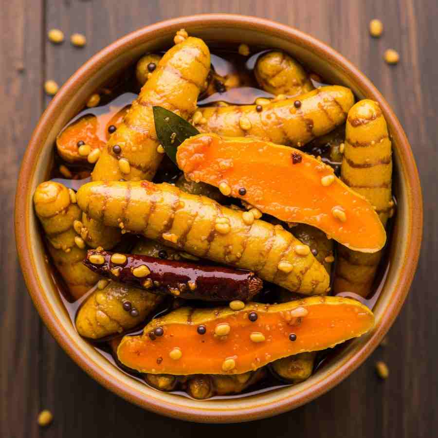 হলুদের আচারেই জব্দ হবে মরসুমি সংক্রমণ।