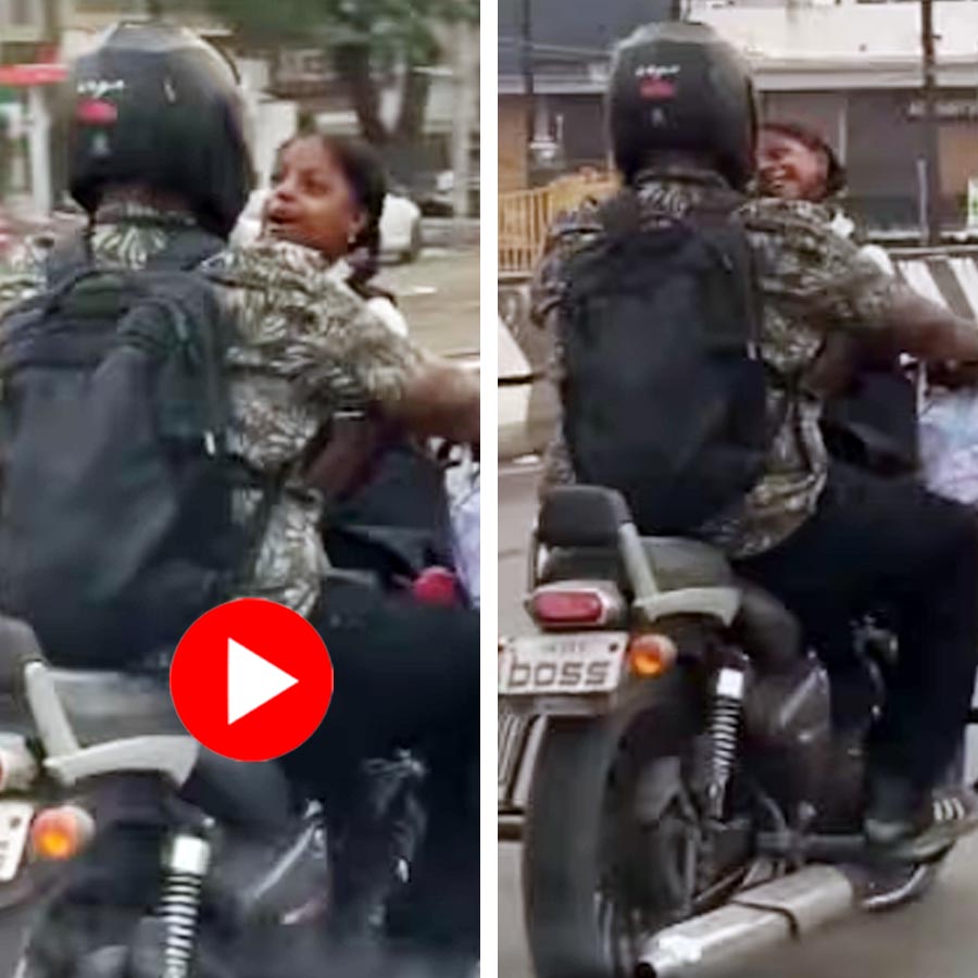 Video shows father riding bike with daughter in a bizarre way