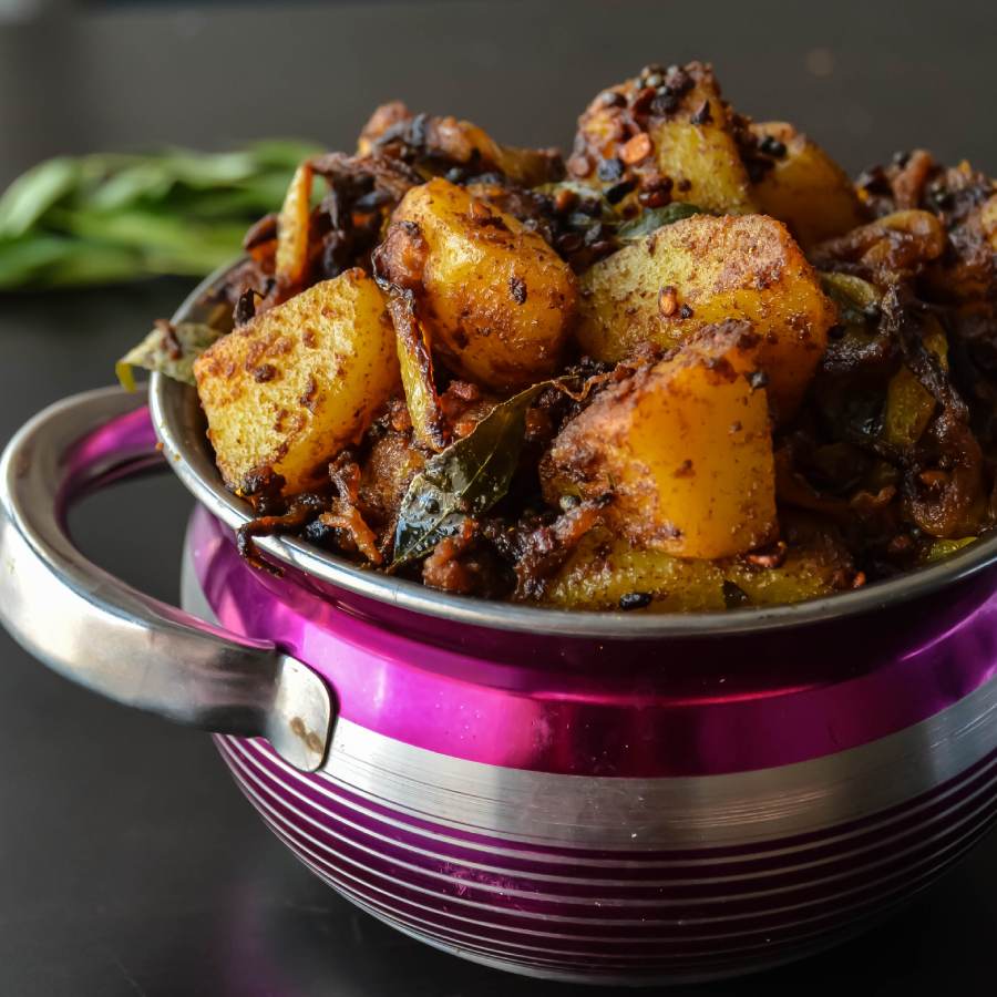 a recipe of special potato fry with curry leaves and Garlic in south indian style dgtl