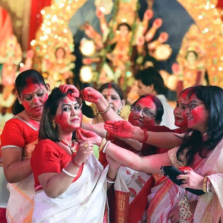 Significance of Sindoor Khela Performed by Married Women on Vijaya Dashami  dgtl