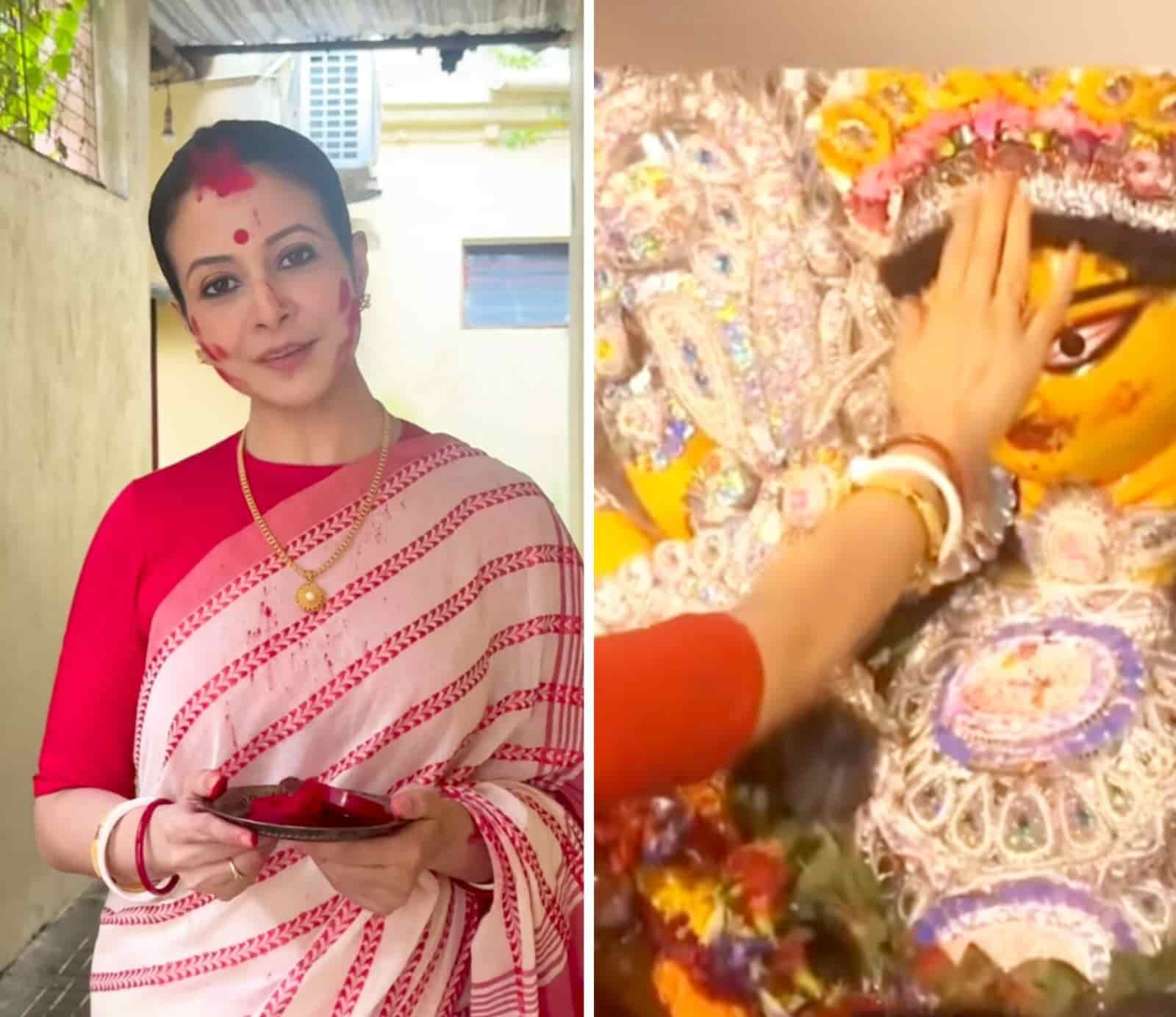  ১০১ বছরের মল্লিক বাড়ির পুজো। পরম যত্নে দেবীকে বরণ করে নিলেন ঘরের মেয়ে কোয়েল মল্লিক। পরনে লাল পাড় সাদা শাড়ি।  