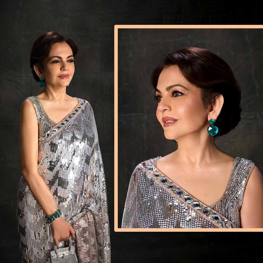Nita Ambani styles shimmer on shimmer in a sequinned Manish Malhotra sari dgtl