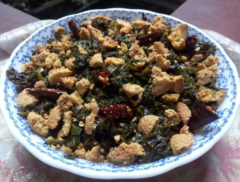 যেখানে হিন্দু শাস্ত্র মেনে বাড়িতে জ্বালানো হয় ১৪ প্রদীপ, খাওয়া হয় ১৪ শাক। 