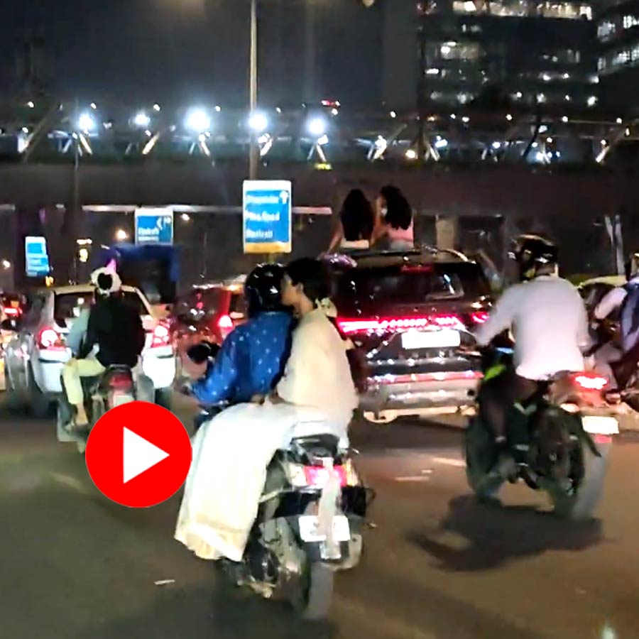 Video of two women spotted sitting on sunroof of moving SUV in Mumbai sparks debate dgtl