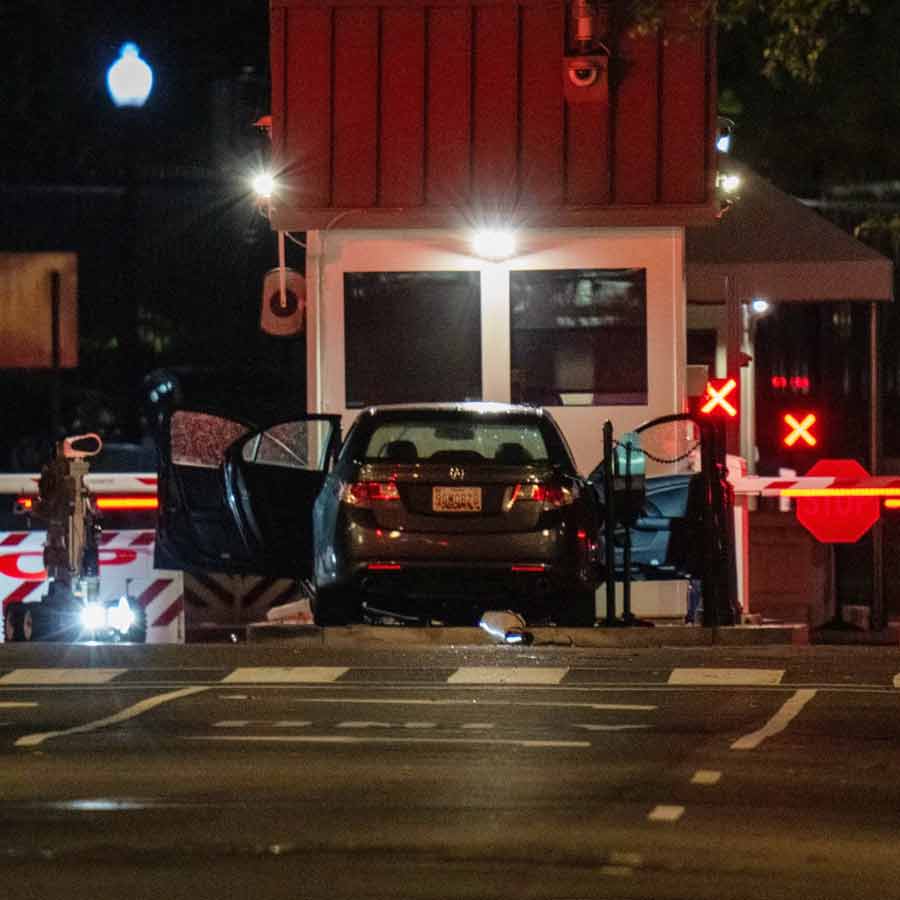 Car rams into White House barricade, suspect arrested