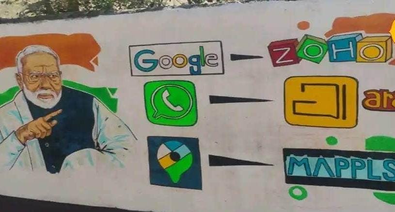 দেওয়াল চিত্রের মাধ্যমে এক দিকে ডোনাল্ড ট্রাম্প ও অন্য দিকে নরেন্দ্র মোদীকে ফুটিয়ে তোলা হয়েছে। 