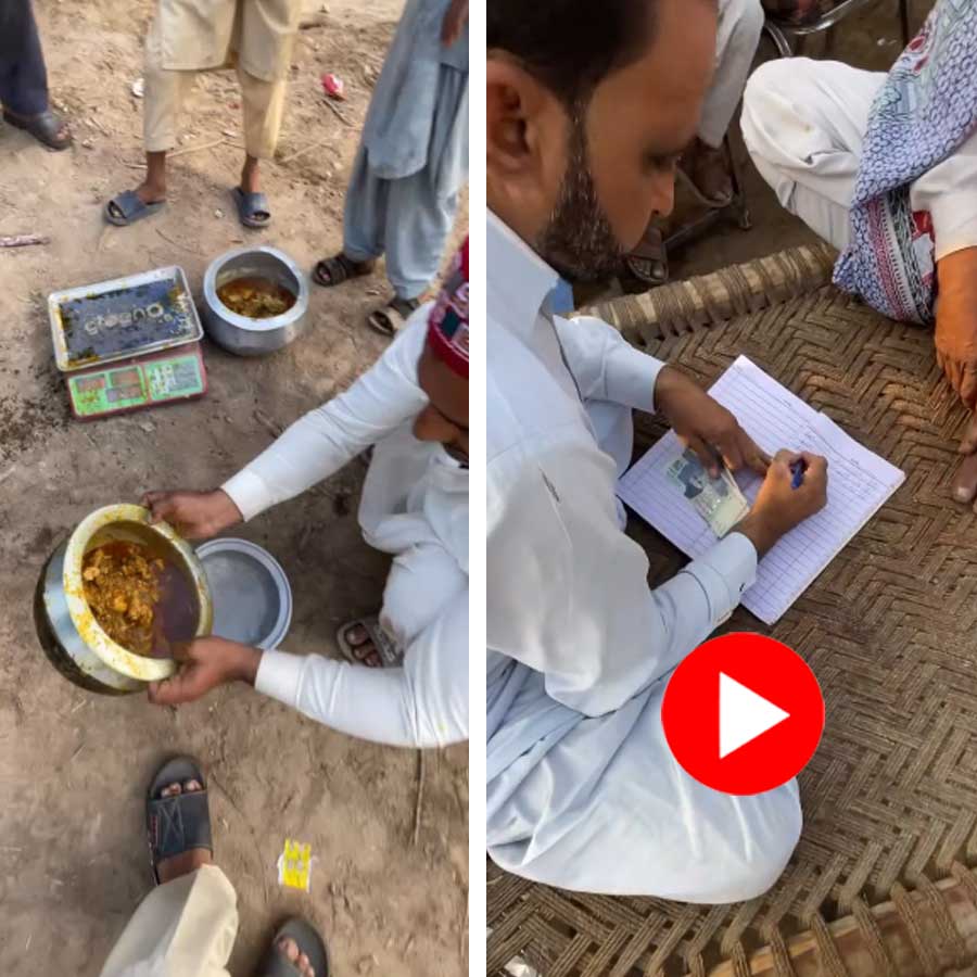 wedding guests pay for their food weighed on a scale in Pakistan