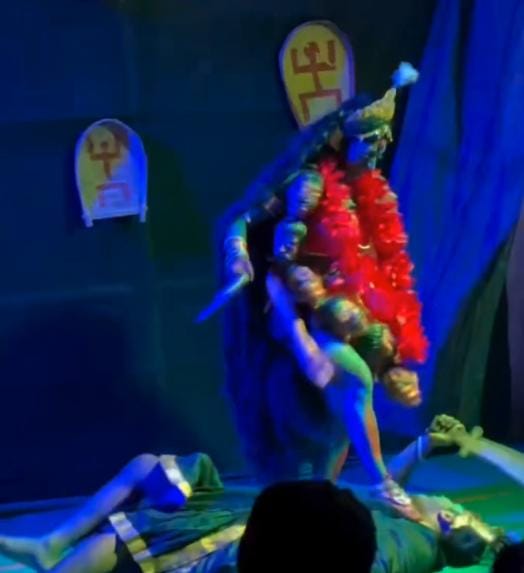 খড়্গ হাতে উদ্দাম নাচে মগ্ন তিনি। 