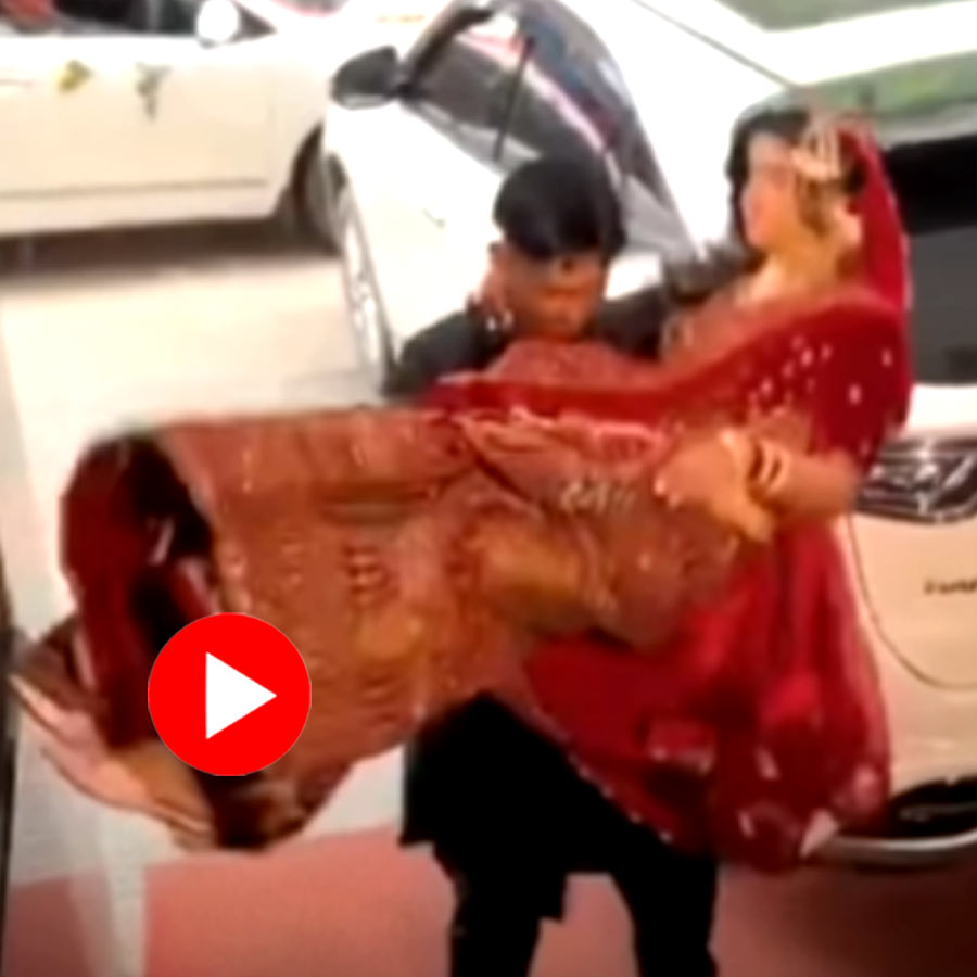 Video shows bride and groom fall in staircase while entering wedding venue