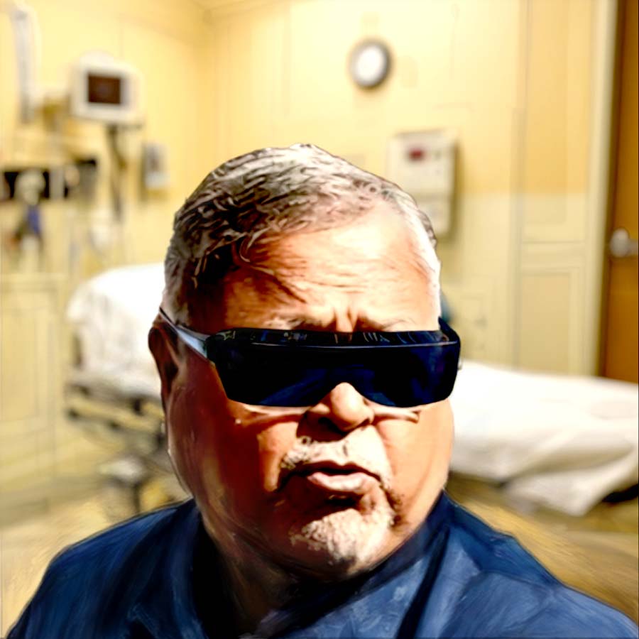 কালো চশমা পরে আদালতে ভার্চুয়াল হাজিরা দিলেন পার্থ চট্টোপাধ্যায়।