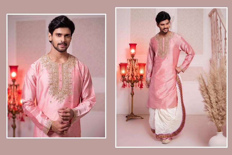 কে বলে গোলাপি কেবল নারীদের রং? ছেলেদের পুজোর সাজে দিব্যি মানায় গোলাপি। এই রঙের সিল্কের কুর্তার গলায় ও হাতে ম্যাট গোল্ড জরির জারদৌসি ভারী নকশা থাকলে ভিড়ের মাঝেও নজর কাড়বে সাজ। একই সুতোর ছোট ছোট বুটি ছড়িয়ে রয়েছে পাঞ্জাবি জুড়ে। পাঞ্জাবির গোলাপি আভা রয়েছে ধুতির পাড়েও। ঘিয়ে রঙের রেশম ধুতির পাড়ে শোভা বাড়িয়েছে মধুবনী আর্ট ওয়ার্ক। নবমী নাইটে নজর কাড়ুন এমনই সাজে। 