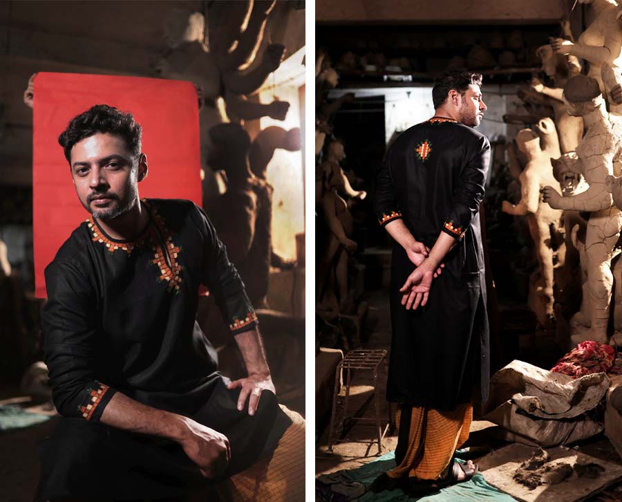 এ পোশাকের বিশেষত্ব এর মেটে হলুদ চৌখুপি নকশায়। যা ধুতিতেও আছে। আবার রয়েছে পাঞ্জাবির গলা ও হাতের কারুকাজেও। সাদাবের ধুতিটি আগে থেকেই সেলাই করা। অর্থাৎ কষ্ট করে কুঁচিয়ে পড়ার ঝঞ্ঝাট নেই। পাজামার মতো গলিয়ে নিলেই হবে।  কালো ঢালা পাড় আর মেটে হলুদে সরু চেকের নকশা করা ধুতির সঙ্গে কালো পাঞ্জাবিই মানাত। তবে তাকে আরও মাননসই করে তুলতে গলায় মেটে হলুদের টুকরো টুকরো চৌকো ইঁটের মতো নকশা বুনেছে উৎসব। তার ফাঁকে ফাঁকে সবুজসুতোর ঘাসের উঁকিঝুঁকি।