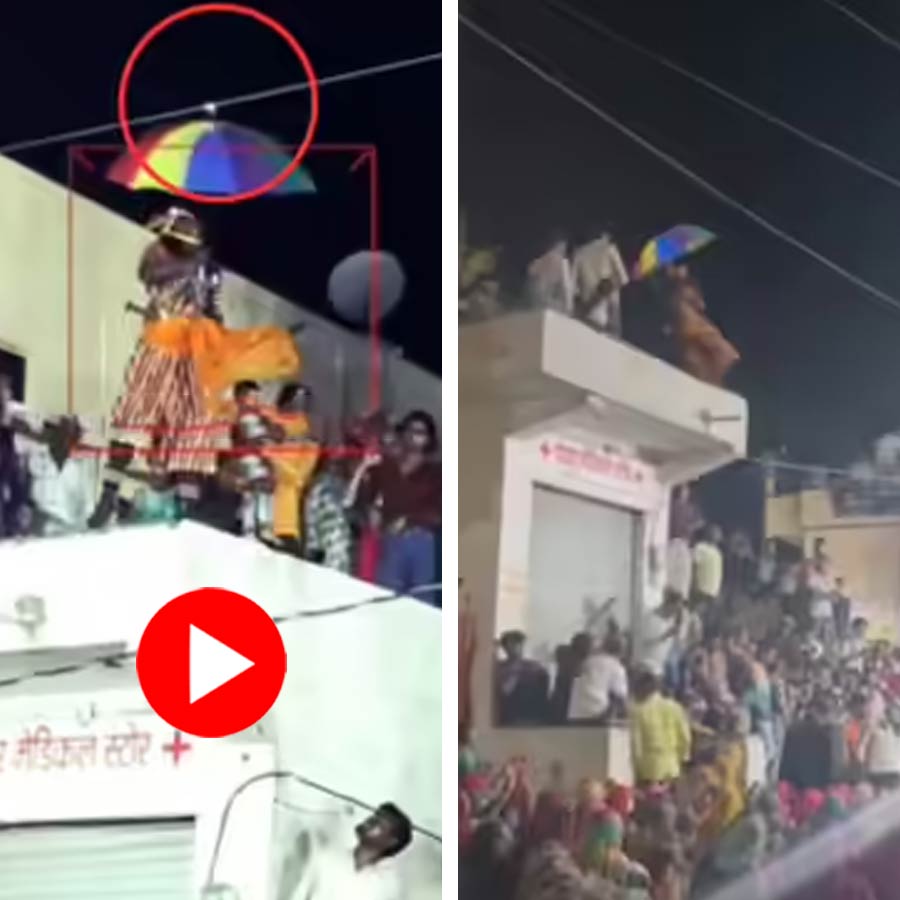 Video shows artist electrocuted after his umbrella touches overhead wire
