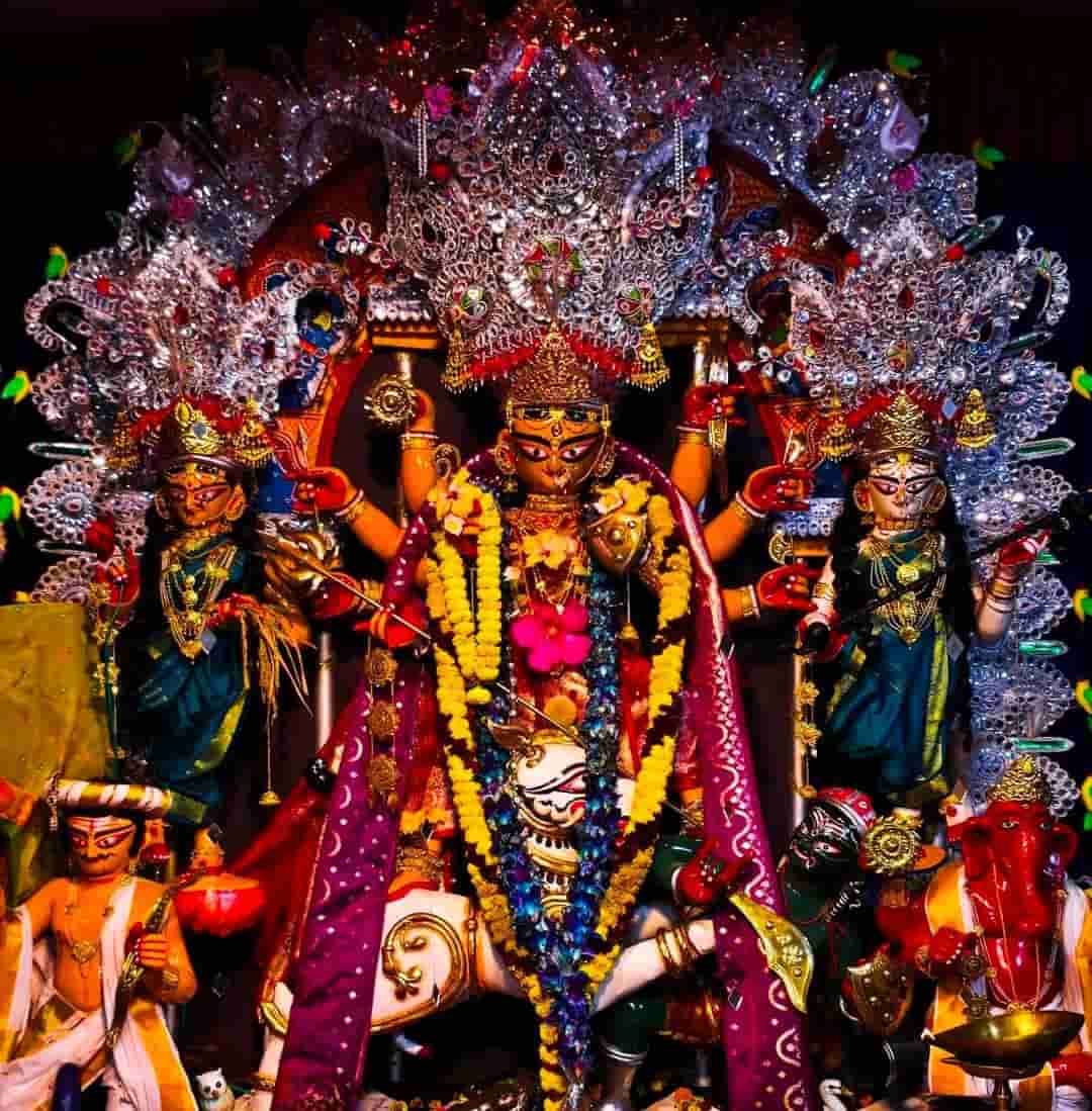 বিদায় বেলায় দেবীকে পরানো হয় ফুলের সাজ।