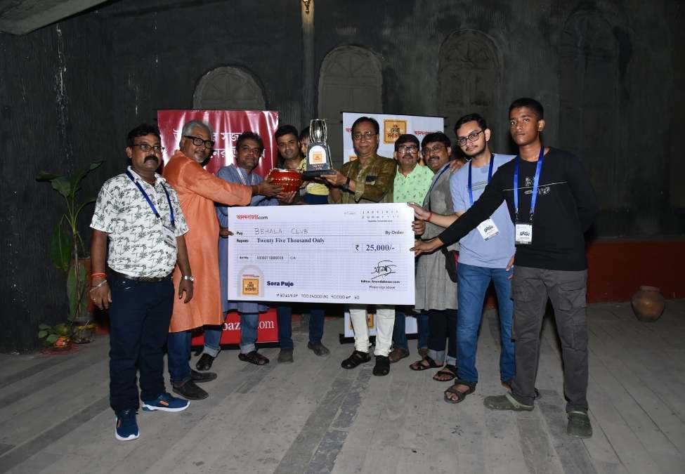 সেরা পুজোর নিরিখে প্রথম আটে রয়েছে বেহালা ক্লাবের পুজোও। (‘আনন্দ উৎসব ২০২৫’-এর সাফল্যের নেপথ্যে রয়েছেন একাধিক সহযোগী। প্রেজ়েন্টিং পার্টনার ‘মারুতি সুজ়ুকি অ্যারেনা’। অন্যান্য সহযোগীরা হলেন ওয়েডিং পার্টনার ‘এবিপি ওয়ানস্টপ ওয়েডিং’, ফ্যাশন পার্টনার ‘কসমো বাজ়ার’, নলেজ পার্টনার ‘টেকনো ইন্ডিয়া ইউনিভার্সিটি’, ব্যাঙ্কিং পার্টনার ‘ইউনিয়ন ব্যাঙ্ক অফ ইন্ডিয়া’, কমফোর্ট পার্টনার ‘কার্লন’)। ( এই প্রতিবেদনটি ‘আনন্দ উৎসব’ ফিচারের একটি অংশ। )