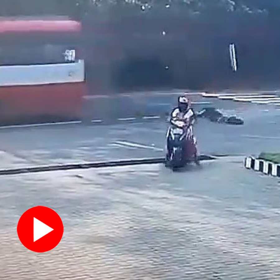 CCTV Video of Sisters Narrowly Escaping Death After Falling From Moving Bus In Karnataka dgtl