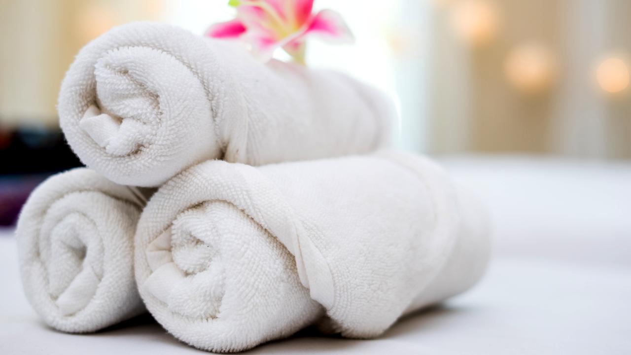 The Secret to Fitting More Towels in Tiny Bathrooms