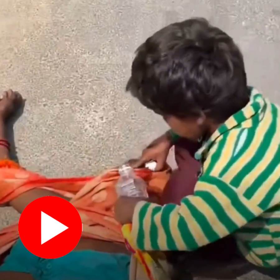 Video claims barefoot boy revives his unconscious mother with water on the roadside