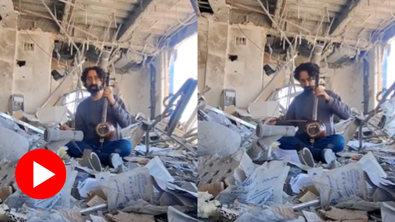 Video shows Iranian Musician playing musical instrument on his school ruins