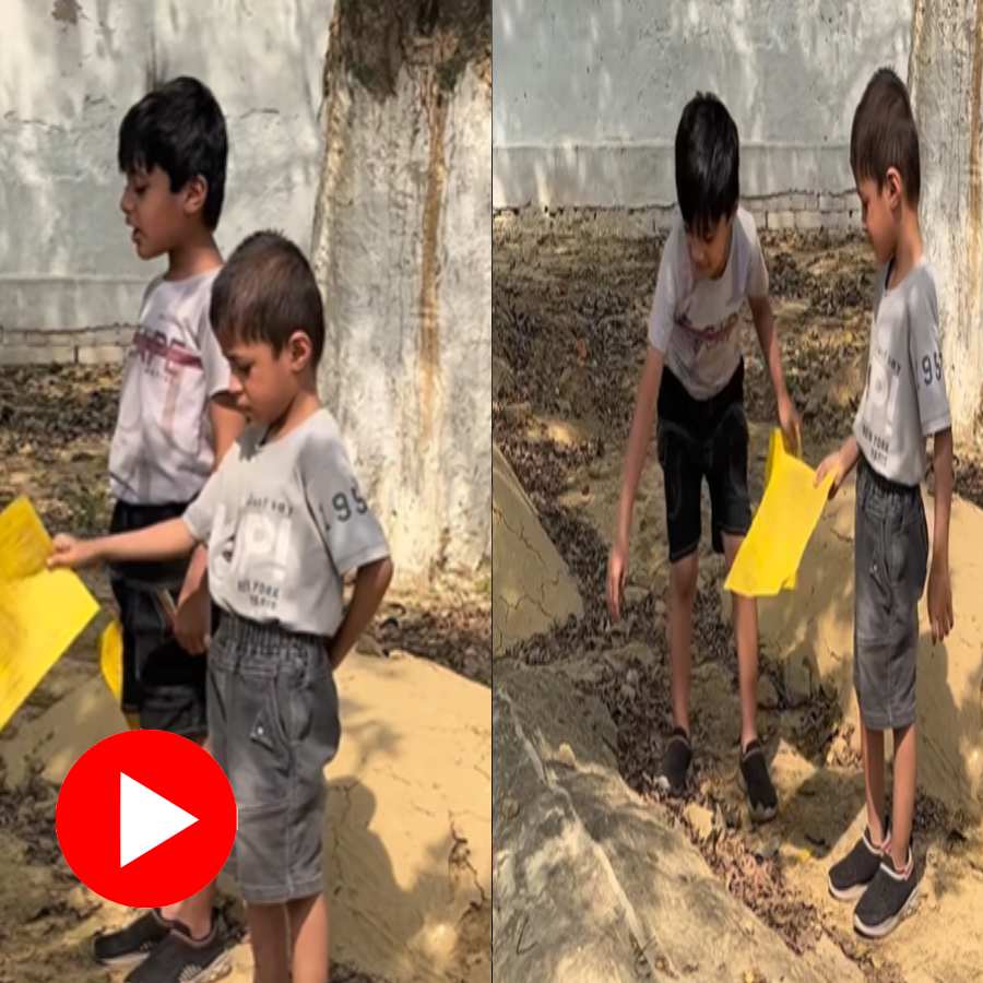 Video claims two boy reached his mother’s grave to show school report card