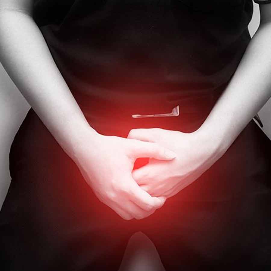 What are the symptoms of penile cancer, and which groups are most affected