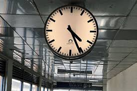 Why does Union Education Minister Dharmendra Pradhan propose to replace GMT with Mahakal Standard Time
