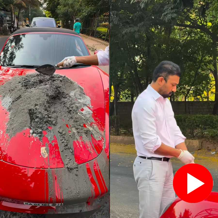 Video shows entrepreneur mixes cement on Porsche bonnet to fix pothole in Bengaluru, internet reacts