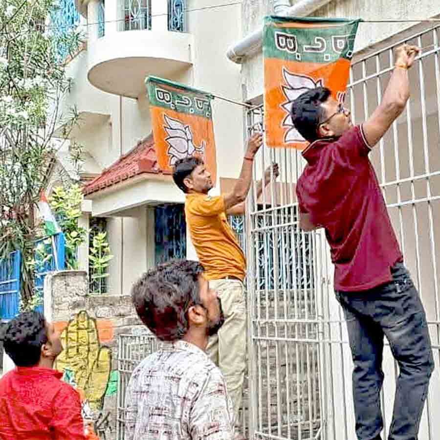 Subrata Moitra, BJP candidate of Berhampore removing their party flags to keep the city clean