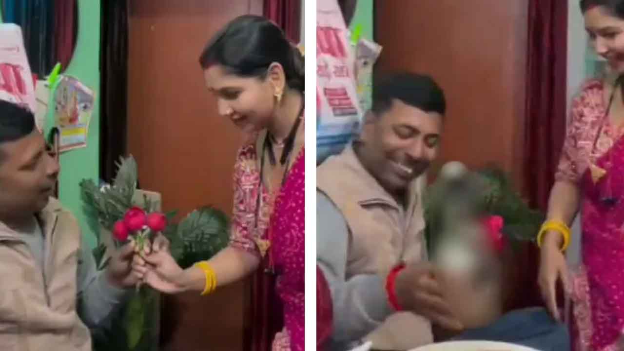 ‘রোজ় ডে’-তে স্বামীকে উপহার দিচ্ছেন কাঞ্চন দেবী। ছবি: সংগৃহীত।