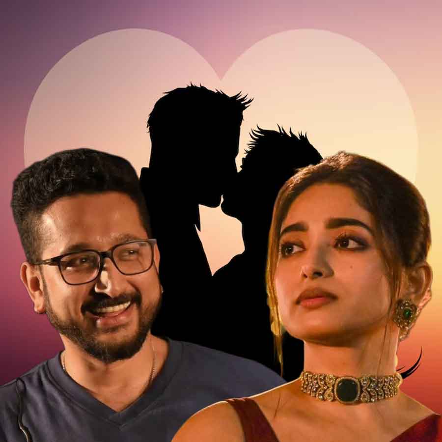 চুম্বন নিয়ে অনর্গল পরমব্রত চট্টোপাধ্যায়, ইশা সাহা।