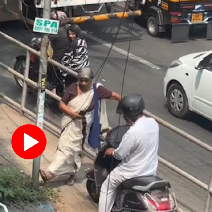 Video of elderly woman blocks scooter rider from using footpath to bypass traffic in Kerala dgtl