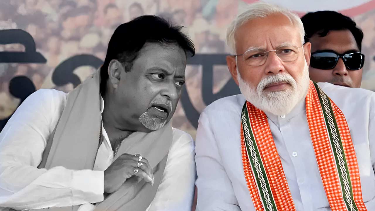 (বাঁ দিকে) মুকুল রায় এবং নরেন্দ্র মোদী (ডান দিকে)।