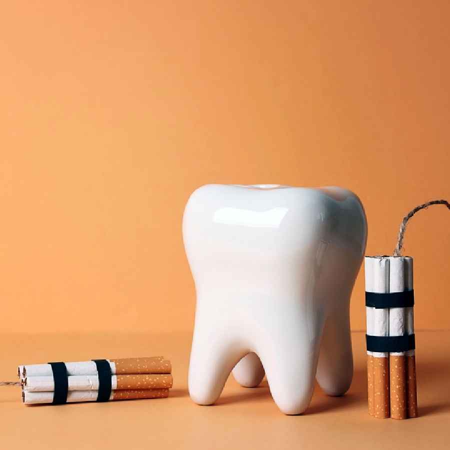 কী ভাবে দাঁতের যত্ন নেবেন ধূমপায়ীরা?