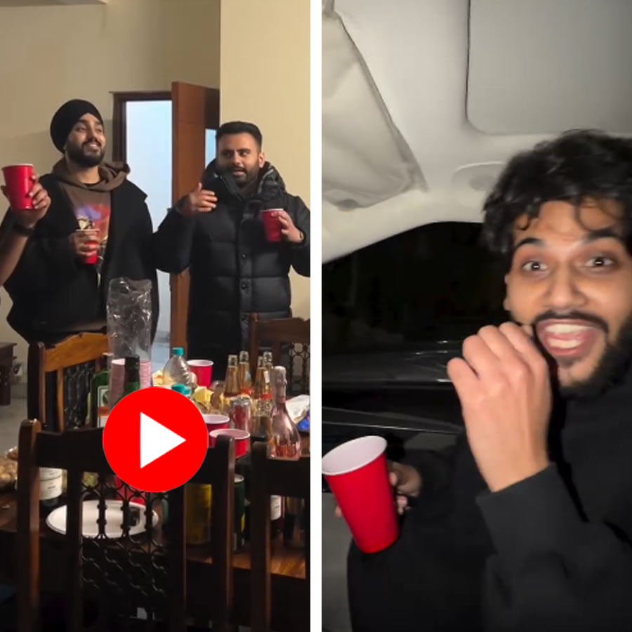 two entrepreneurs present their earliest employee with a new SUV