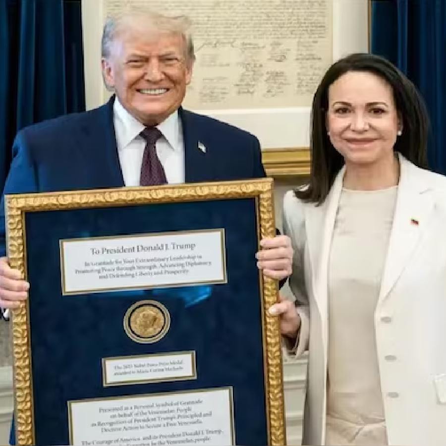Venezuela's Maria Corina Machado presents her Nobel Peace Prize to Donald Trump during White House meet dgtl
