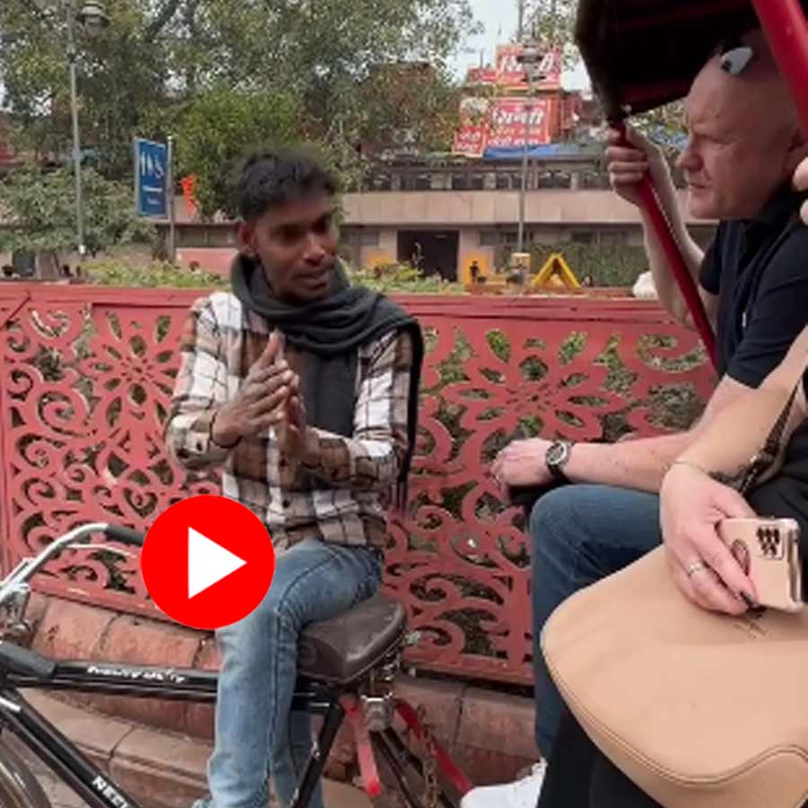 ricksaw puller is speaking fluent English