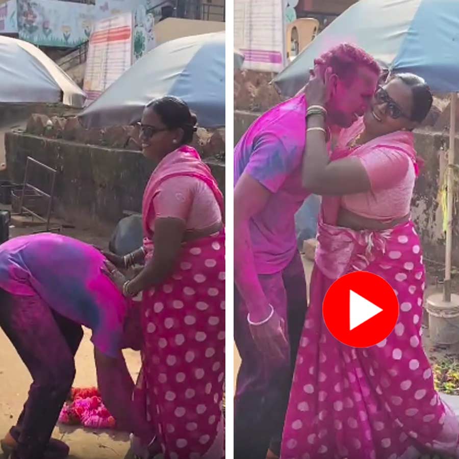 young man falling at his mother’s feet and hugging her after his selection for the CRPF